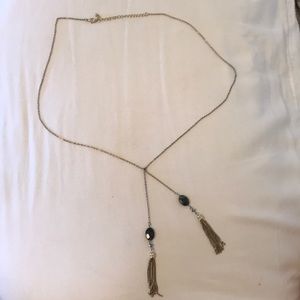 Long gold chain necklace with stone tassel accent